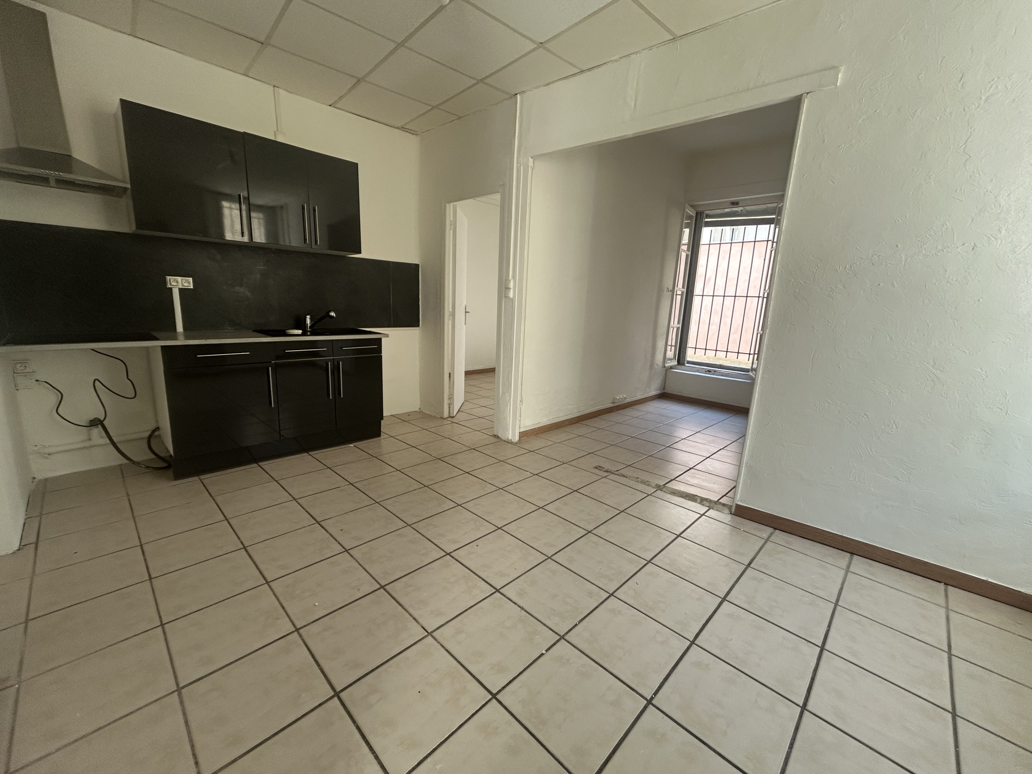 P2 en RDC avec terrasse privative   Idéal investisseur !